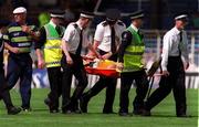 25 July 1999; Offaly's Hubert Rigney is stretchered off during the Offaly v Antrim, All Ireland Hurling Championship Quarter Finals, Croke Park, Dublin. Picture credit; Damien Eagers/SPORTSFILE