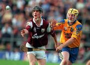 10 July 1999;  Galway's Ollie Fahy in action against Roscommon's Paul Connolly. Connacht Hurling Final, Galway v Roscommon, Dr. Hyde Park, Roscommon. Picture credit; Brendan Moran/SPORTSFILE.