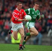19 June 1999; Padraig O'Mahony, Cork, in action against Jason Stokes, Limerick. Cork v Limerick, Munster Football Championship, Páirc U’ Rinn, Cork. Picture credit; Brendan Moran/SPORTSFILE