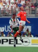 4 July 1994; Phil Babb Republic of Ireland in action against Denis Bergkamp, 1994 World Cup Finals, Orlando, Florida. Soccer. Picture credit; David Maher/SPORTSFILE