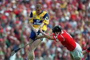 4 July 1999; Ronan O'Hara, Clare, in action against John Browne, Cork. Cork v Clare, Munster Senior Hurling Final, Semple Stadium, Thurles. Picture credit; Damien Eagers/SPORTSFILE