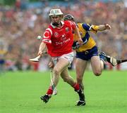4 July 1999; Timmy McCarthy, Cork, in action against Sean McMahon, Clare. Cork v Clare, Munster Senior Hurling Final, Semple Stadium, Thurles. Picture credit; Damien Eagers/SPORTSFILE