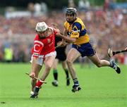 4 July 1999; Timmy McCarthy, Cork, in action against Sean McMahon, Clare. Cork v Clare, Munster Senior Hurling Final, Semple Stadium, Thurles. Picture credit; Damien Eagers/SPORTSFILE