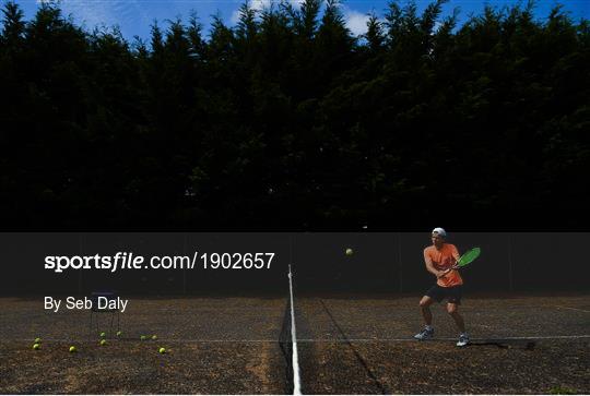 Tennis player Simon Carr training in Isolation Tennis player Simon Carr training in Isolation