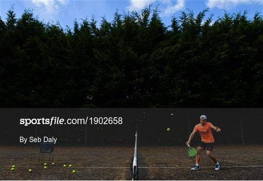 Tennis player Simon Carr training in Isolation Tennis player Simon Carr training in Isolation