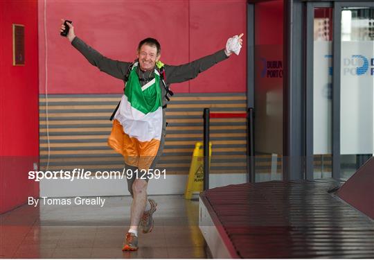 ‘Around the World’ Irish runner arrives home