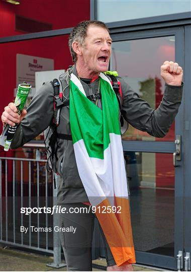 ‘Around the World’ Irish runner arrives home
