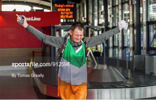 ‘Around the World’ Irish runner arrives home