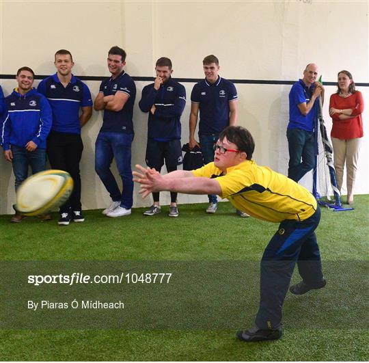 Leinster Rugby Academy players and the Lakers officially unveil the newly renovated Brady Centre