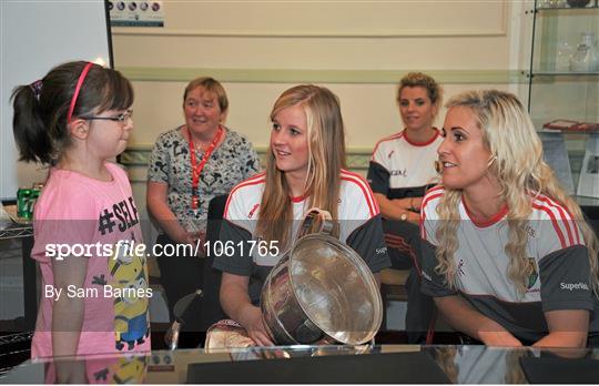 Victorious Cork Ladies Gaelic team visit Temple Street Hospital