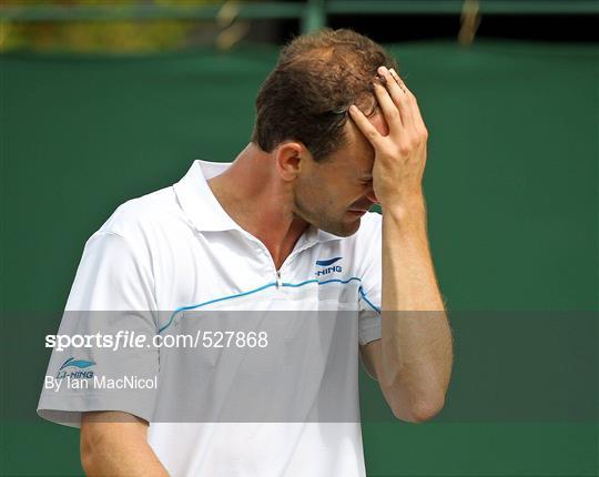 Adrian Mannarino v Conor Niland - The Championships - Wimbledon 2011 - Round 1